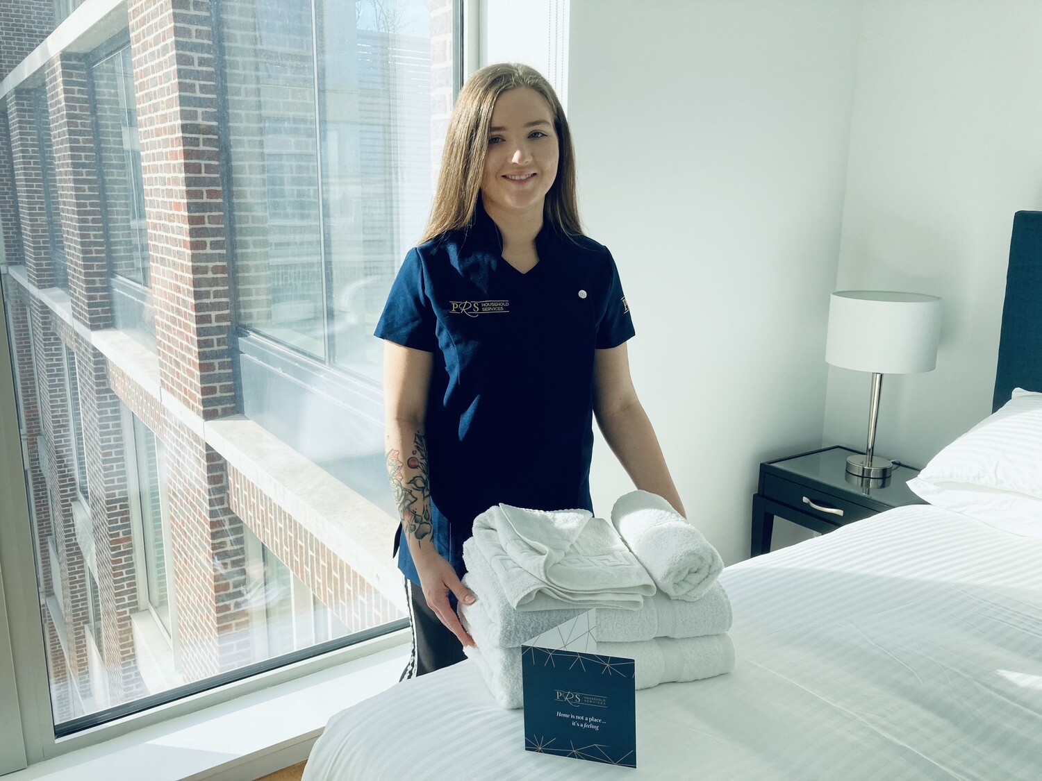 woman holding towels