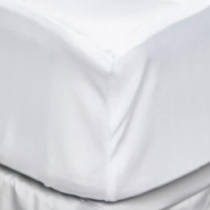 a close up of white bedding